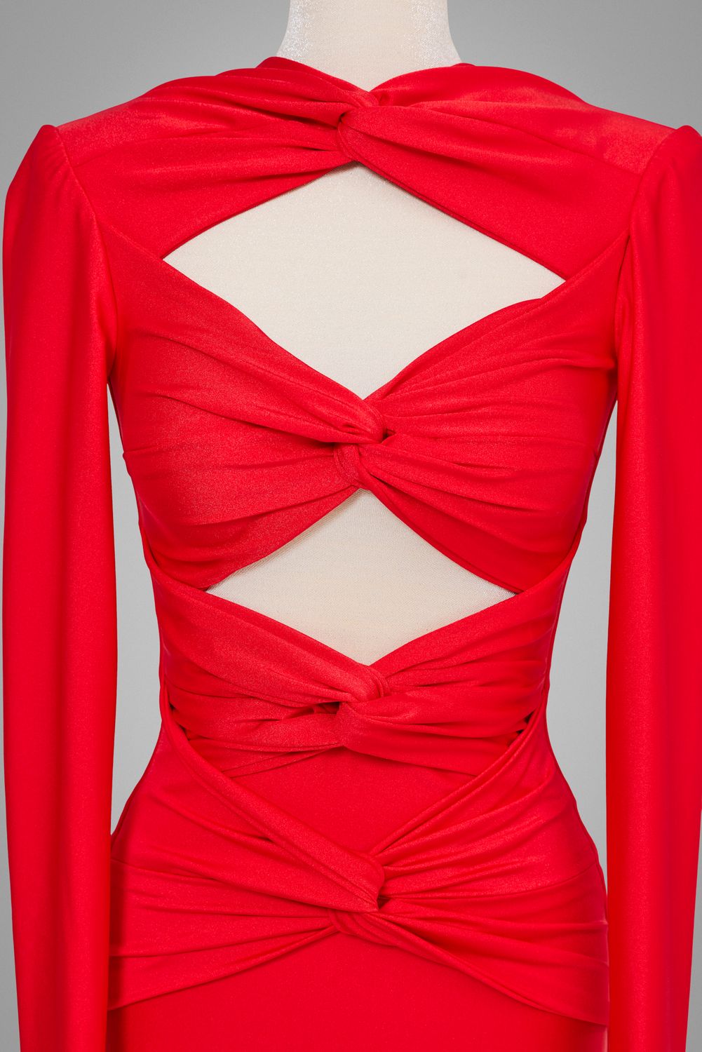 Elegantes rotes Kleid mit Cut-outs, langen Ärmeln und figurbetonter Silhouette